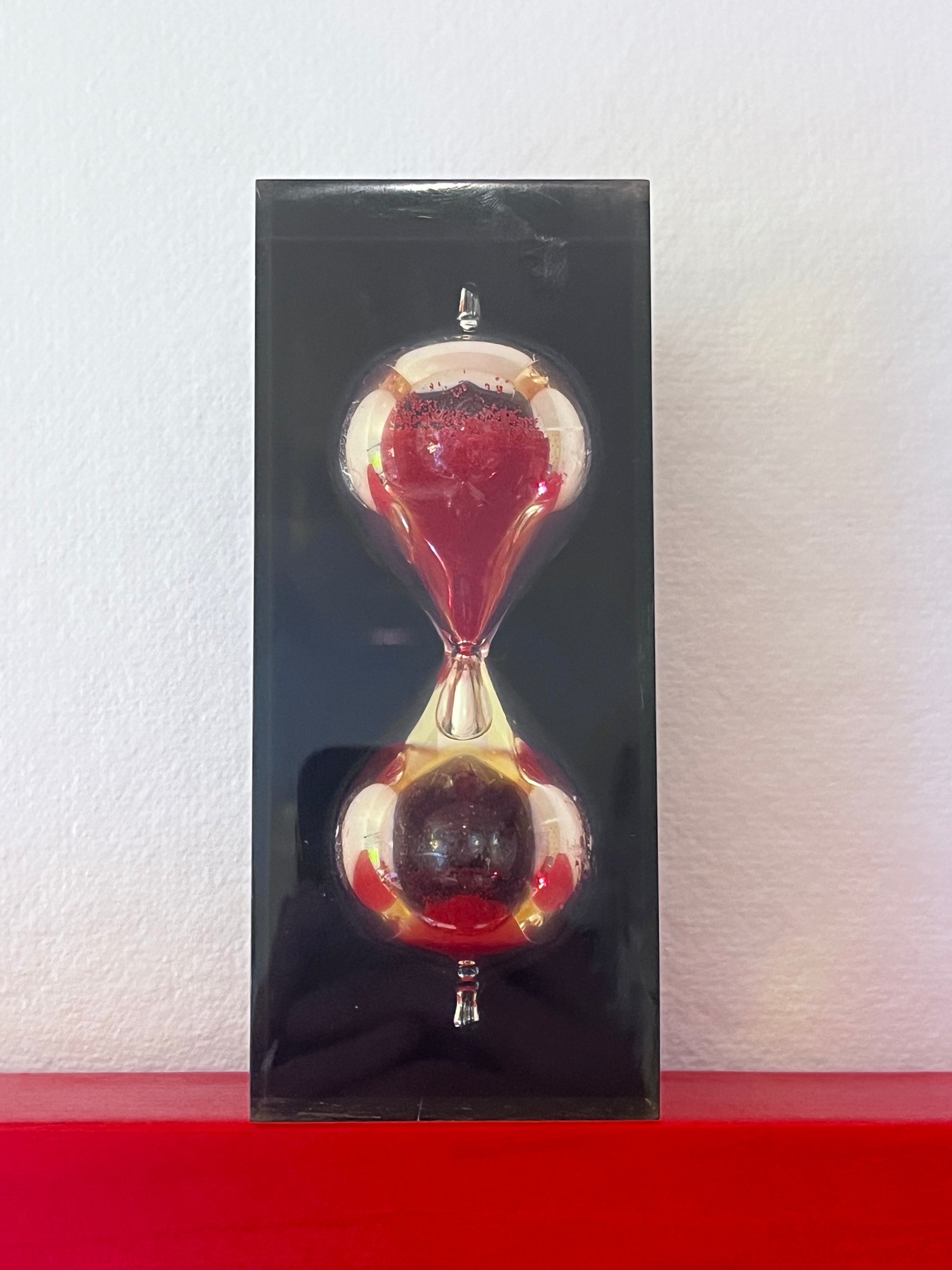 Crazy Hourglass Encased in Resin